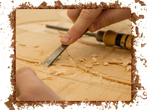 50 50 Pic 1 An image of wood carving tools with a sharpened cutting edge.