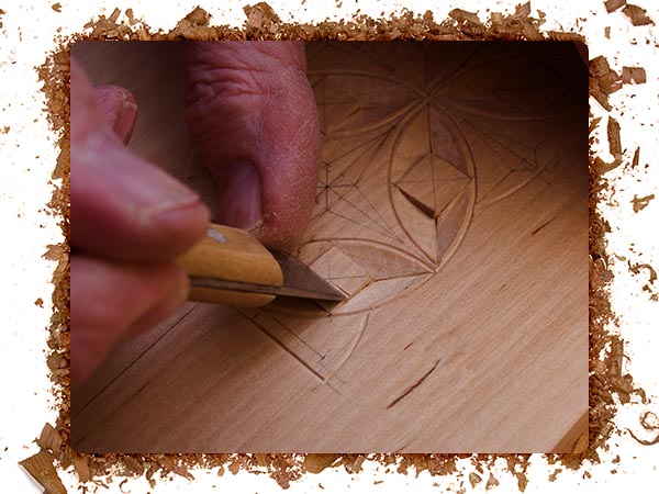 Caring For Wood Carving Tools BB 50 50 Pic 1 An image of a person using a wood carving tool to carve unique designs.
